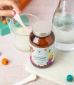 Colostrum z mleczkiem pszczelim, cynkiem i bananem Miodziś - proszek 61 g Manufaktura Rodziny Sadowskich
